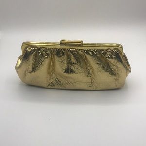 Vintage, Gold clutch purse. Snap latch closure.
